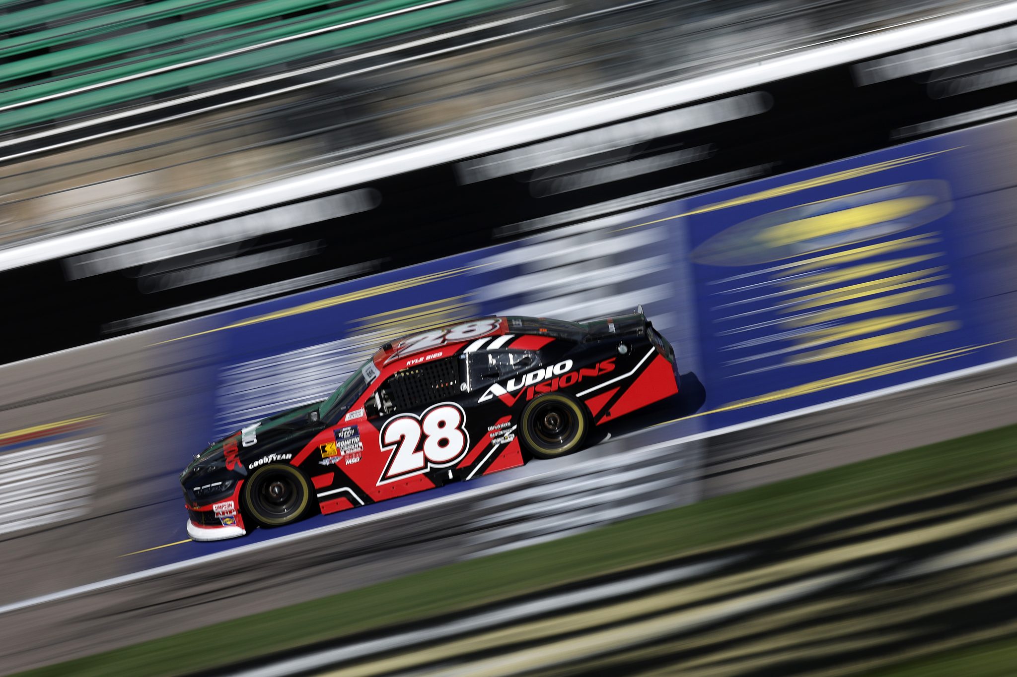 KANSAS CITY, KANSAS - SEPTEMBER 27: Kyle Sieg, driver of the #28 Audio Visions Ford, drives during practice for the NASCAR Xfinity Series Kansas Lottery 300 at Kansas Speedway on September 27, 2025 in Kansas City, Kansas. (Photo by Sean Gardner/Getty Images) | Getty Images