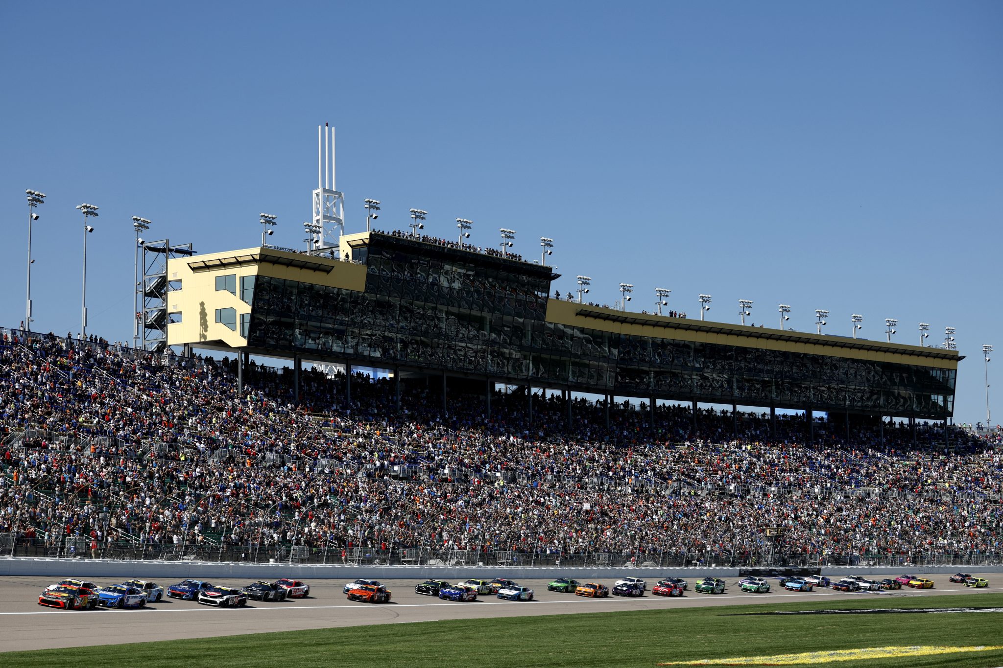 KANSAS CITY, KANSAS - SEPTEMBER 28: Chase Briscoe, driver of the #19 Bass Pro Shops Toyota, leads the field to start the NASCAR Cup Series Hollywood Casino 400 Presented by ESPN BET at Kansas Speedway on September 28, 2025 in Kansas City, Kansas. (Photo by Sean Gardner/Getty Images) | Getty Images