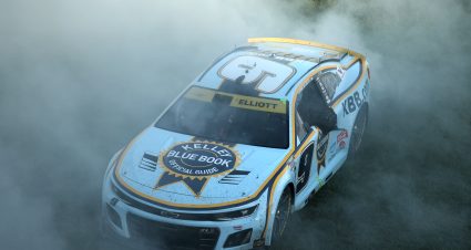 KANSAS CITY, KANSAS - SEPTEMBER 28: Chase Elliott, driver of the #9 Kelley Blue Book Chevrolet, celebrates with a burnout after winning the NASCAR Cup Series Hollywood Casino 400 Presented by ESPN BET at Kansas Speedway on September 28, 2025 in Kansas City, Kansas. (Photo by Chris Graythen/Getty Images) | Getty Images