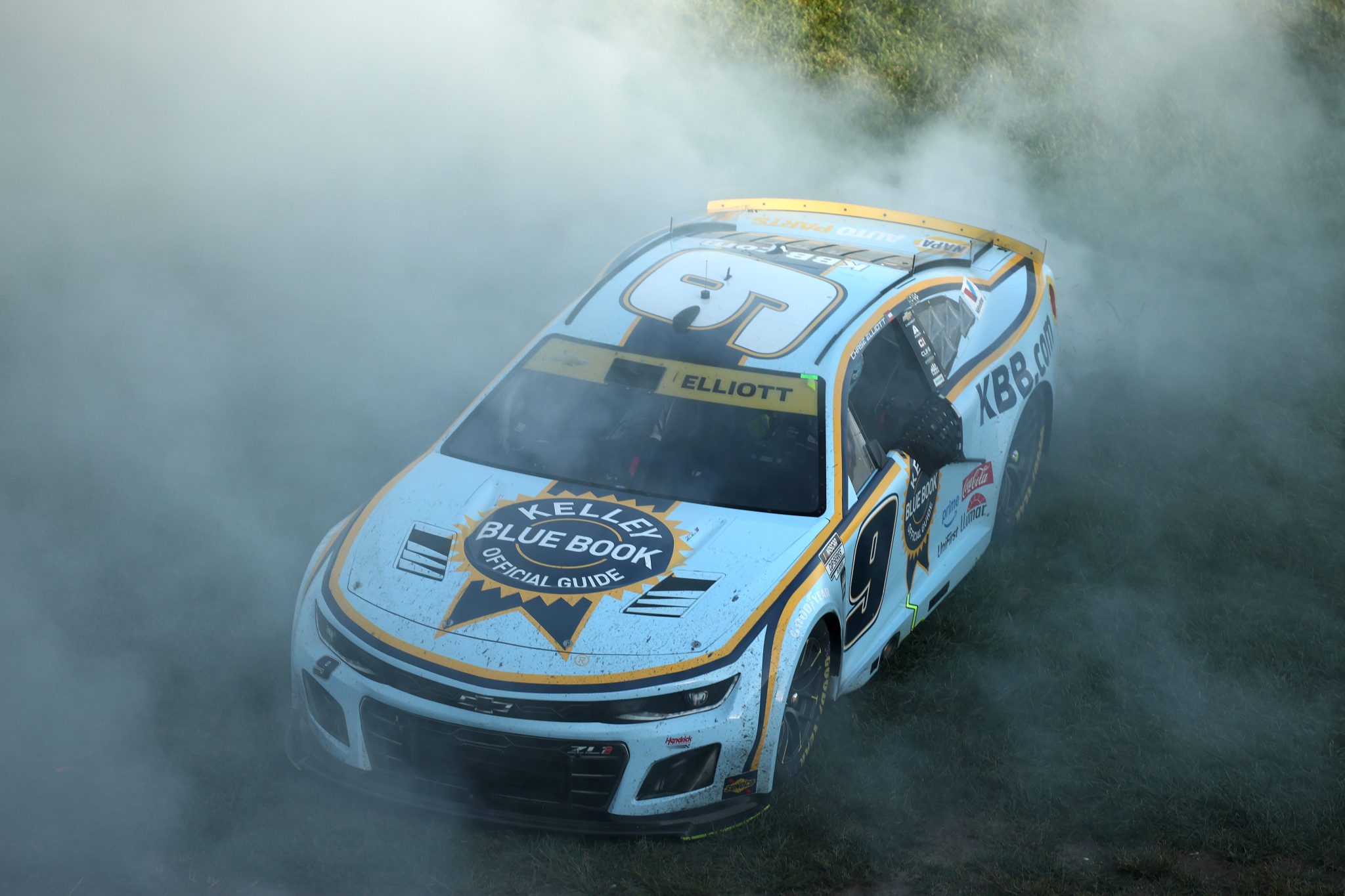 KANSAS CITY, KANSAS - SEPTEMBER 28: Chase Elliott, driver of the #9 Kelley Blue Book Chevrolet, celebrates with a burnout after winning the NASCAR Cup Series Hollywood Casino 400 Presented by ESPN BET at Kansas Speedway on September 28, 2025 in Kansas City, Kansas. (Photo by Chris Graythen/Getty Images) | Getty Images