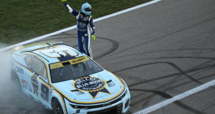 KANSAS CITY, KANSAS - SEPTEMBER 28: Chase Elliott, driver of the #9 Kelley Blue Book Chevrolet, celebrates after winning the NASCAR Cup Series Hollywood Casino 400 Presented by ESPN BET at Kansas Speedway on September 28, 2025 in Kansas City, Kansas. (Photo by Chris Graythen/Getty Images) | Getty Images