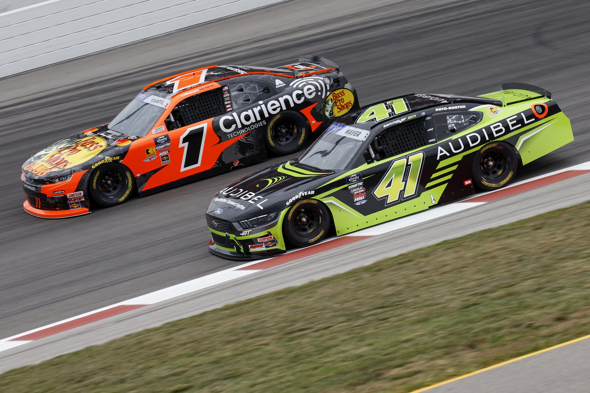 MADISON, ILLINOIS - SEPTEMBER 05: Carson Kvapil, driver of the #1 Bass Pro Shops/Claritence Tech Chevrolet, and Sam Mayer, driver of the #41 Audibel Ford, drive during practice for the NASCAR Xfinity Series Nu Way 200 Sauced by Blues Hog at WWT Raceway on September 05, 2025 in Madison, Illinois. (Photo by Sean Gardner/Getty Images) | Getty Images