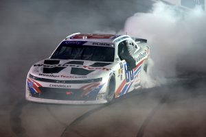 MADISON, ILLINOIS - SEPTEMBER 06: Connor Zilisch, driver of the #88 WeatherTech Chevrolet, celebrates with a burnout after winning the NASCAR Xfinity Series Nu Way 200 Sauced by Blues Hog at WWT Raceway on September 06, 2025 in Madison, Illinois. (Photo by Chris Graythen/Getty Images) | Getty Images