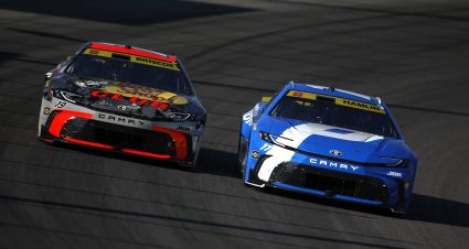 MADISON, ILLINOIS - SEPTEMBER 07: Chase Briscoe, driver of the #19 Bass Pro Shops Toyota, and Denny Hamlin, driver of the #11 Progressive Toyota, race during the NASCAR Cup Series Enjoy Illinois 300 at WWT Raceway on September 07, 2025 in Madison, Illinois. (Photo by Sean Gardner/Getty Images) | Getty Images