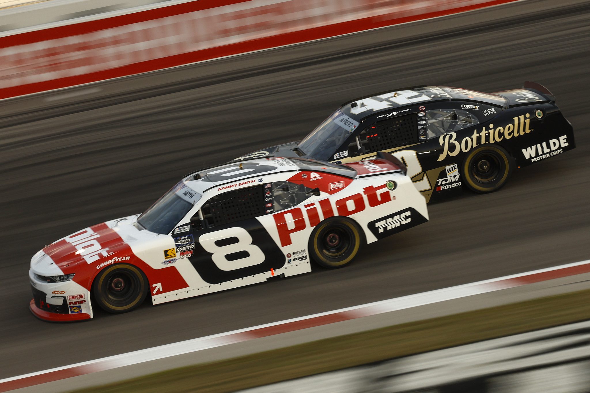 MADISON, ILLINOIS - SEPTEMBER 06: Sammy Smith, driver of the #8 Pilot Chevrolet, and Anthony Alfredo, driver of the #42 Botticelli Chevrolet, race during the NASCAR Xfinity Series Nu Way 200 Sauced by Blues Hog at WWT Raceway on September 06, 2025 in Madison, Illinois. (Photo by Sean Gardner/Getty Images) | Getty Images