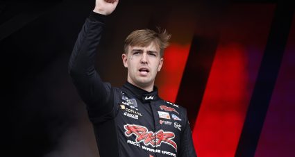 TALLADEGA, ALABAMA - OCTOBER 18: Carson Ware, driver of the #74 Costa Oil Filters Chevrolet, waves to fans as he walks onstage during driver intros prior to the NASCAR Xfinity Series United Rentals 250 at Talladega Superspeedway on October 18, 2025 in Talladega, Alabama. (Photo by Sean Gardner/Getty Images) | Getty Images