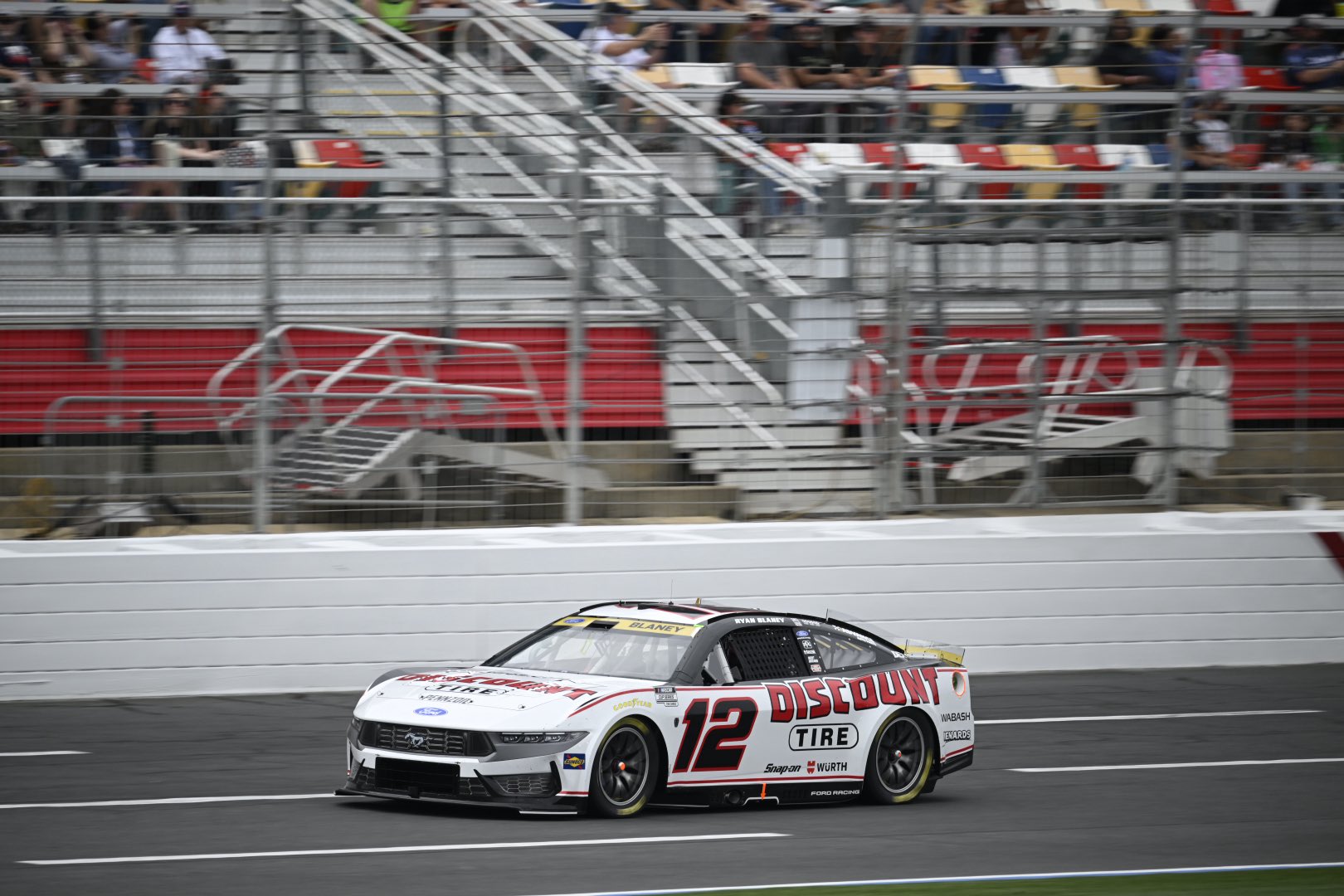 CONCORD, NORTH CAROLINA - OCTOBER 11: Ryan Blaney, driver of the #12 Discount Tire Ford, drives during the NASCAR Cup Series Bank of America 400 at Charlotte Motor Speedway on October 11, 2026 in Concord, North Carolina. (Photo from Team Penske)