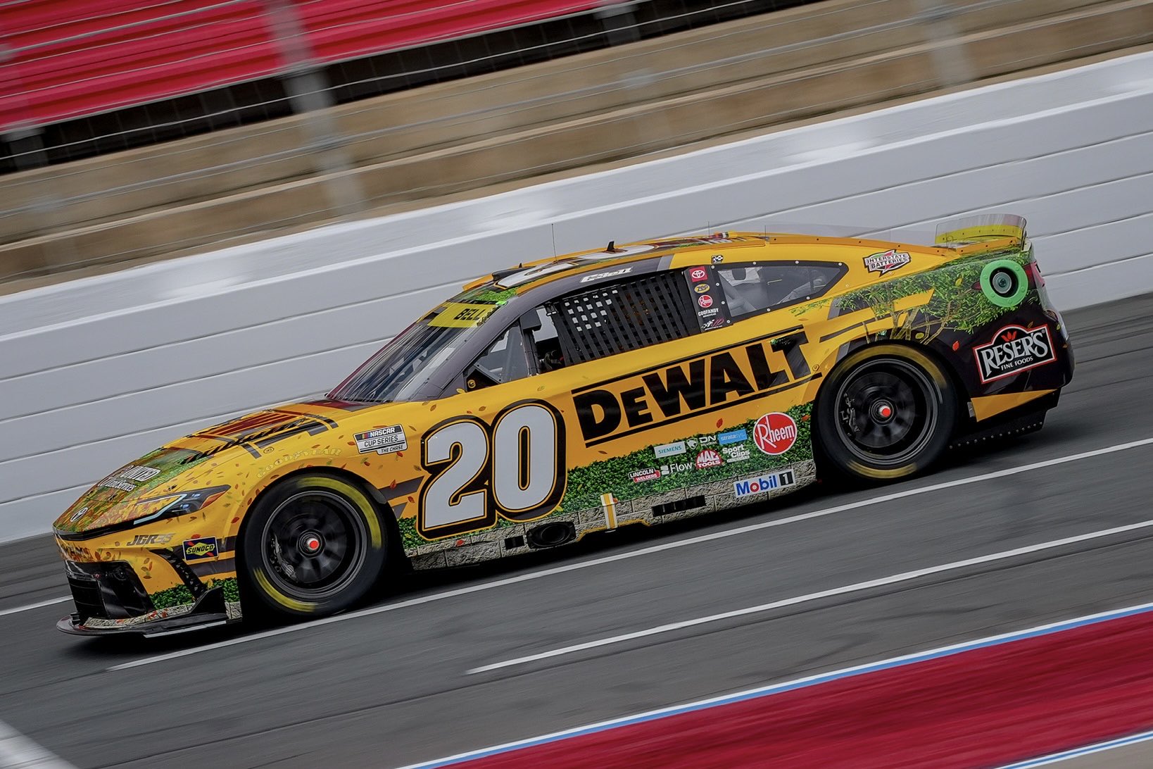 CONCORD, NORTH CAROLINA - OCTOBER 11: Christopher Bell, driver of the #20 DeWalt Toyota, drives during the NASCAR Cup Series Bank of America 400 at Charlotte Motor Speedway on October 11, 2026 in Concord, North Carolina. (Photo from Joe Gibbs Racing)