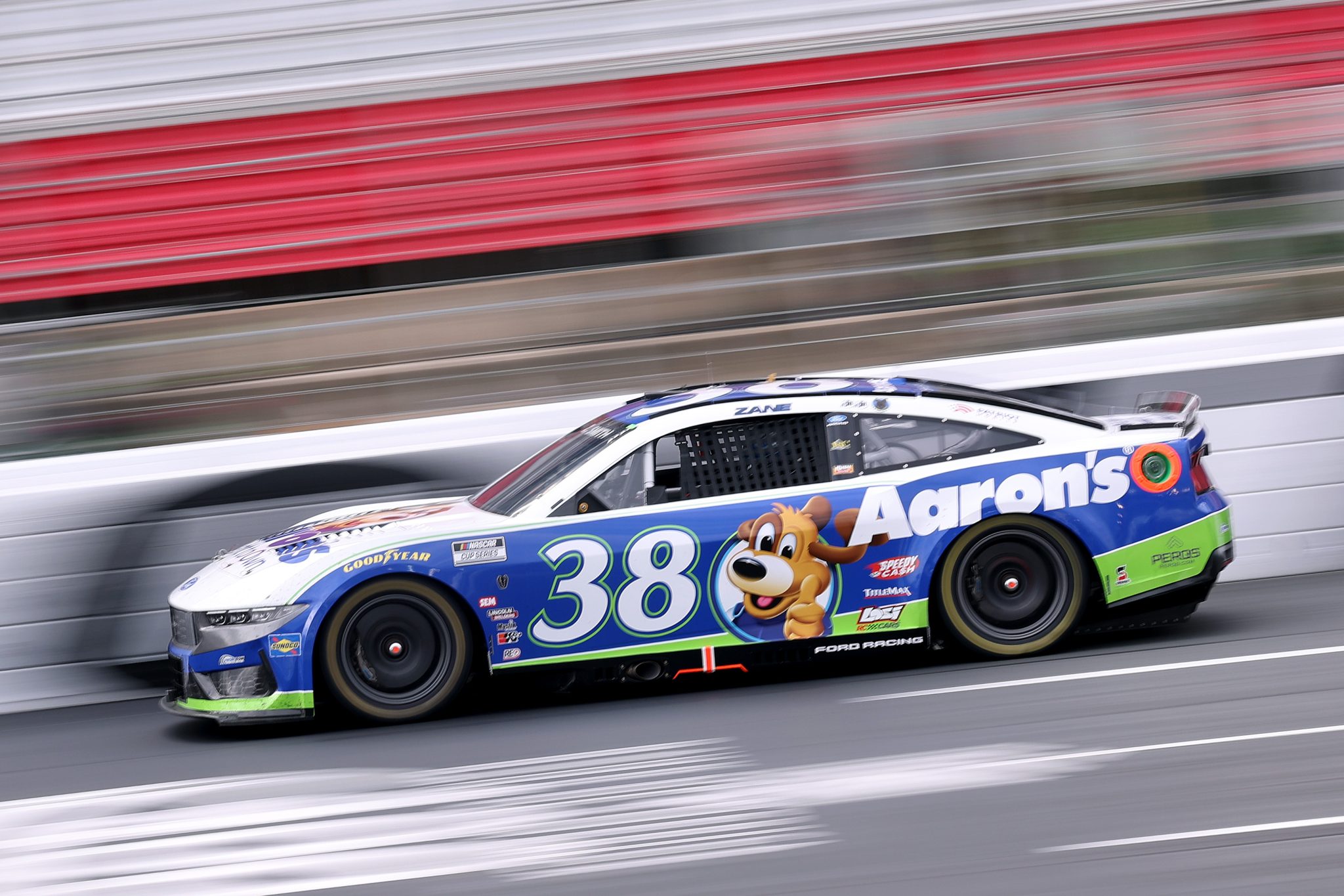CONCORD, NORTH CAROLINA - OCTOBER 11: Zane Smith, driver of the #38 Aaron's Rent To Own Ford, drives during the NASCAR Cup Series Bank of America 400 at Charlotte Motor Speedway on October 11, 2026 in Concord, North Carolina. (Photo by David Jensen/Getty Images) | Getty Images