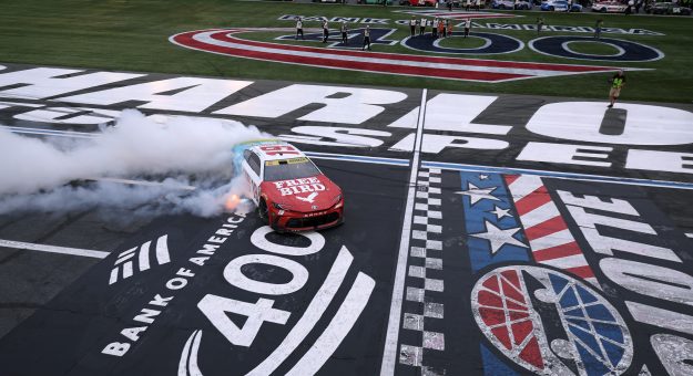 CONCORD, NORTH CAROLINA - OCTOBER 11: Chase Briscoe, driver of the #19 Freebird Spring Water Toyota, celebrates with a burnout after winning the NASCAR Cup Series Bank of America 400 at Charlotte Motor Speedway on October 11, 2026 in Concord, North Carolina. (Photo by David Jensen/Getty Images) | Getty Images