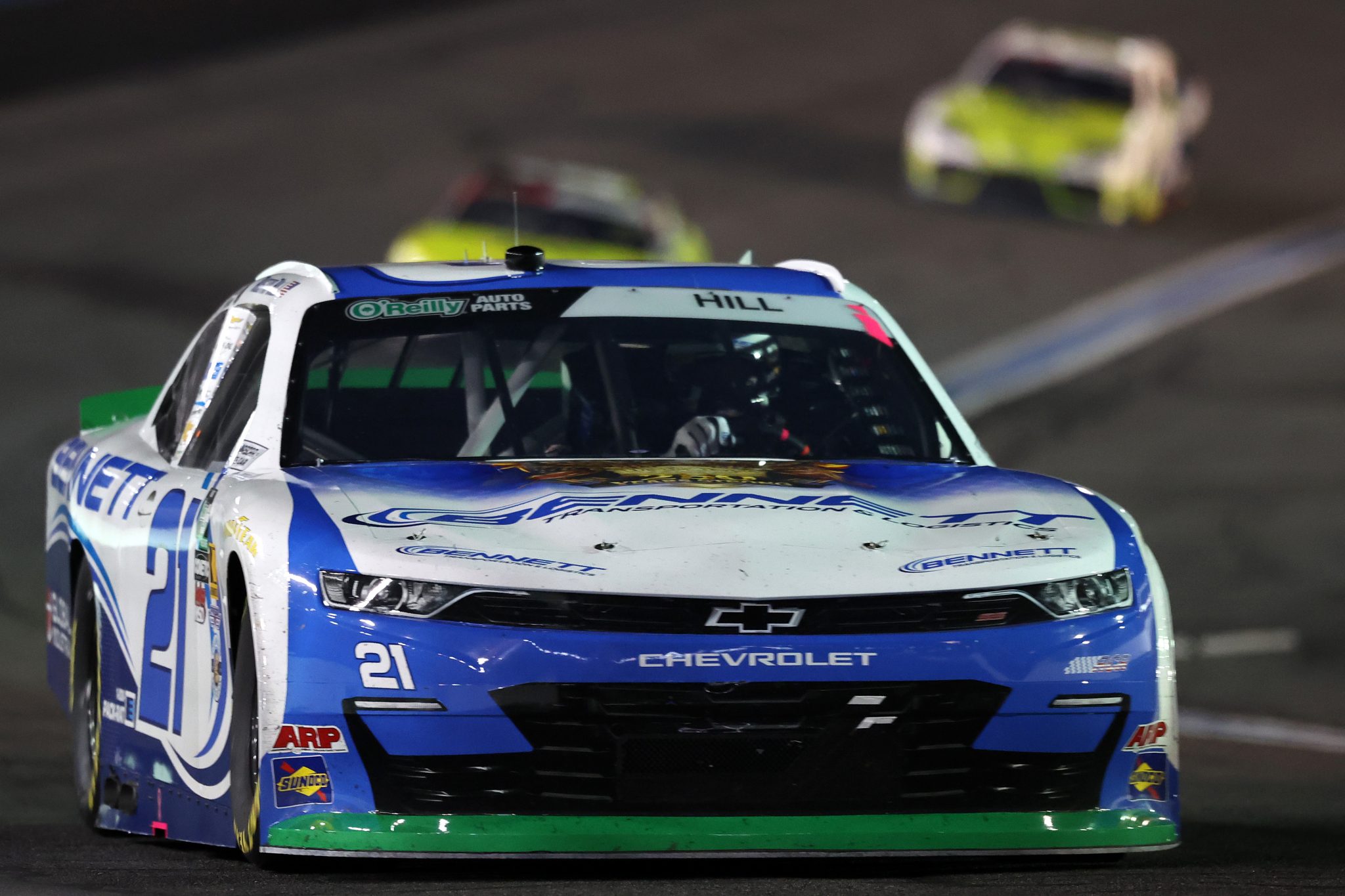 CONCORD, NORTH CAROLINA - OCTOBER 11: Austin Hill, driver of the #21 Bennett Transportation Chevrolet, drives during the NASCAR O'Reilly Auto Parts Series Blue Cross NC 300 at Charlotte Motor Speedway on October 11, 2026 in Concord, North Carolina. (Photo by David Jensen/Getty Images) | Getty Images
