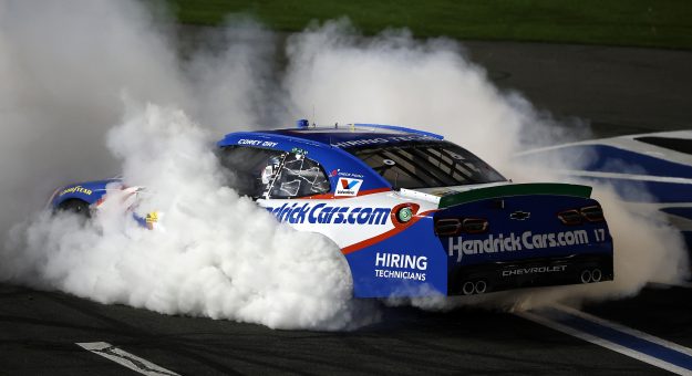 CONCORD, NORTH CAROLINA - OCTOBER 11: Corey Day, driver of the #17 HendrickCars.com Chevrolet, celebrates with a burnout after winning the NASCAR O'Reilly Auto Parts Series Blue Cross NC 300 at Charlotte Motor Speedway on October 11, 2026 in Concord, North Carolina. (Photo by Jared C. Tilton/Getty Images) | Getty Images