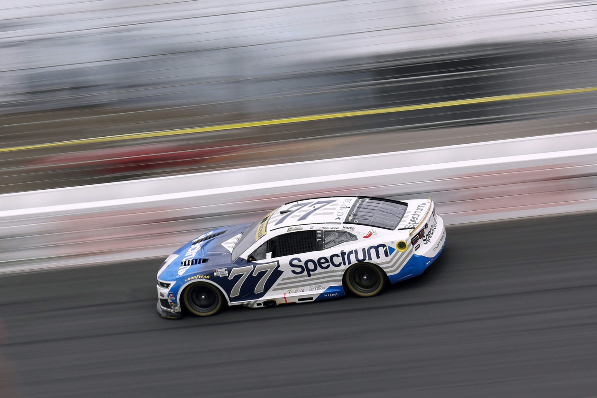 CONCORD, NORTH CAROLINA - OCTOBER 11: Carson Hocevar, driver of the #77 Spectrum Chevrolet, drives during the NASCAR Cup Series Bank of America 400 at Charlotte Motor Speedway on October 11, 2026 in Concord, North Carolina. (Photo by David Jensen/Getty Images) | Getty Images