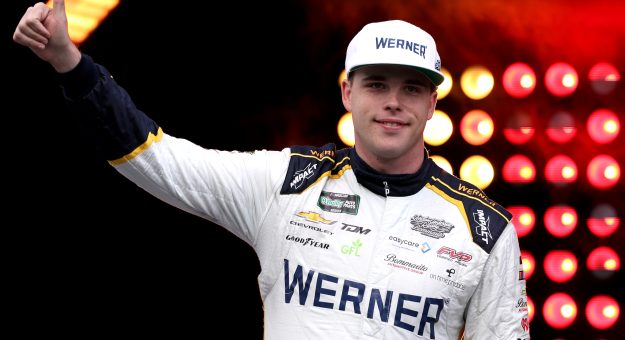 KANSAS CITY, KANSAS - APRIL 18: Blaine Perkins, driver of the #31 WERNER Chevrolet, gives a thumbs up as he walks onstage during driver intros prior to the NASCAR O'Reilly Auto Parts Series Kansas Lottery 300 at Kansas Speedway on April 18, 2026 in Kansas City, Kansas. (Photo by David Jensen/Getty Images) | Getty Images
