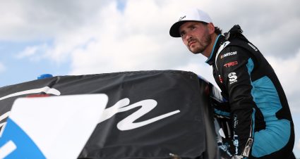 LOUDON, NEW HAMPSHIRE - AUGUST 21: Tanner Gray, driver of the #15 Place of Hope Toyota, enters his truck during qualifying for the NASCAR Craftsman Truck Series Team EJP 175 at New Hampshire Motor Speedway on August 21, 2026 in Loudon, New Hampshire. (Photo by Meg Oliphant/Getty Images) | Getty Images