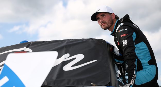 LOUDON, NEW HAMPSHIRE - AUGUST 21: Tanner Gray, driver of the #15 Place of Hope Toyota, enters his truck during qualifying for the NASCAR Craftsman Truck Series Team EJP 175 at New Hampshire Motor Speedway on August 21, 2026 in Loudon, New Hampshire. (Photo by Meg Oliphant/Getty Images) | Getty Images