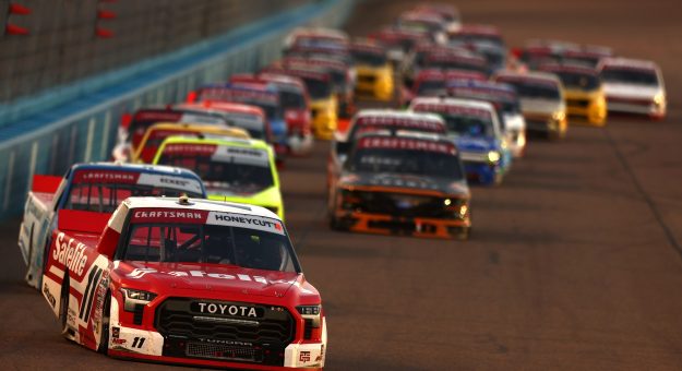 AVONDALE, ARIZONA - OCTOBER 16: Kaden Honeycutt, driver of the #11 Safelite Toyota, leads the field during the NASCAR Craftsman Truck Series Zero Carbon Bioethanol 150 Powered by POET at Phoenix Raceway on October 16, 2026 in Avondale, Arizona. (Photo by Meg Oliphant/Getty Images) | Getty Images
