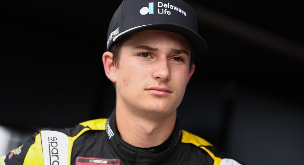 LOUDON, NEW HAMPSHIRE - AUGUST 21: Tristan McKee, driver of the #77 Delaware Life Chevrolet, looks on during qualifying for the NASCAR Craftsman Truck Series Team EJP 175 at New Hampshire Motor Speedway on August 21, 2026 in Loudon, New Hampshire. (Photo by Meg Oliphant/Getty Images) | Getty Images