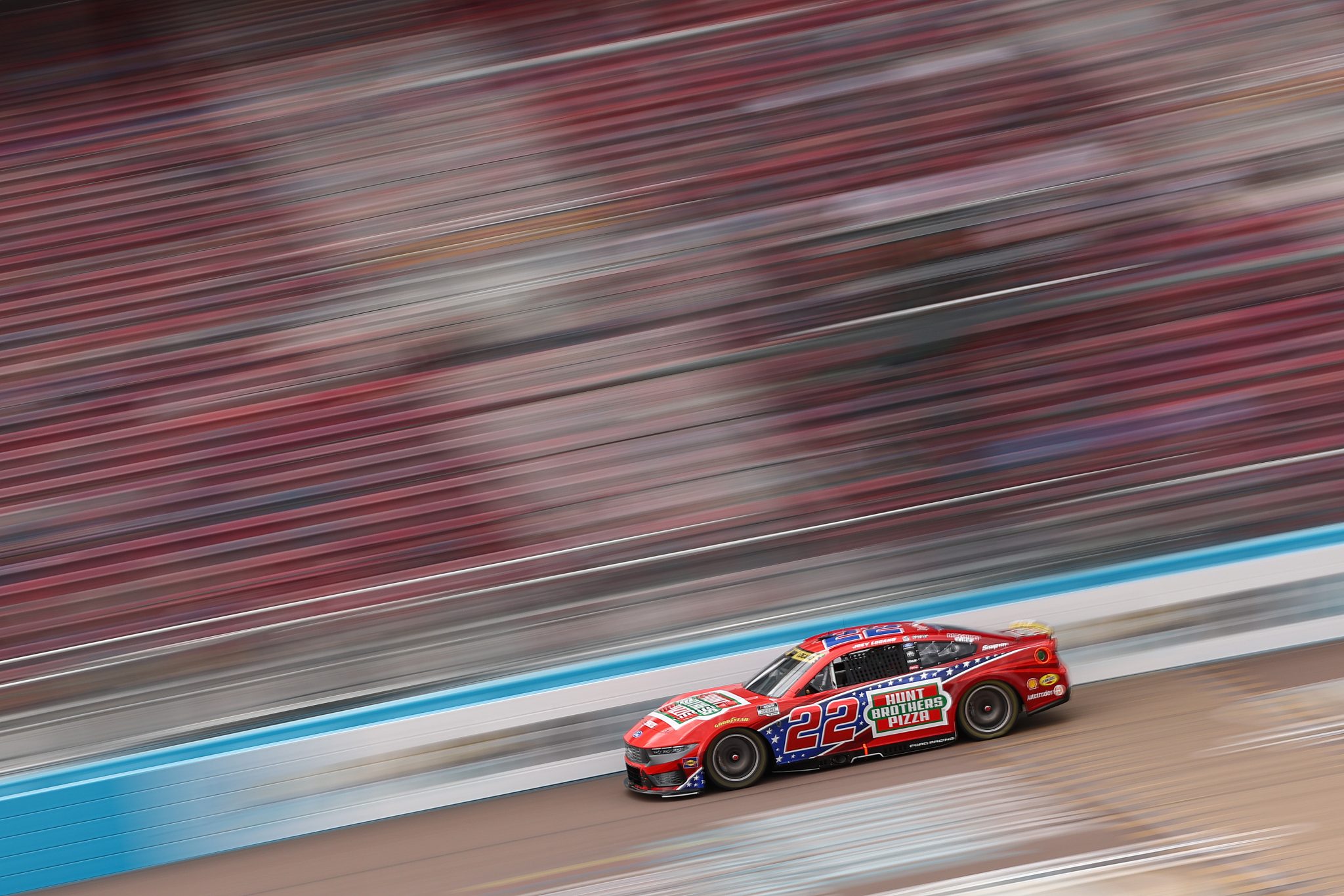 AVONDALE, ARIZONA - OCTOBER 17: Joey Logano, driver of the #22 Hunt Brothers Pizza Ford, drives during practice for the NASCAR Cup Series Freeway Insurance 500 at Phoenix Raceway on October 17, 2026 in Avondale, Arizona. (Photo by Meg Oliphant/Getty Images) | Getty Images
