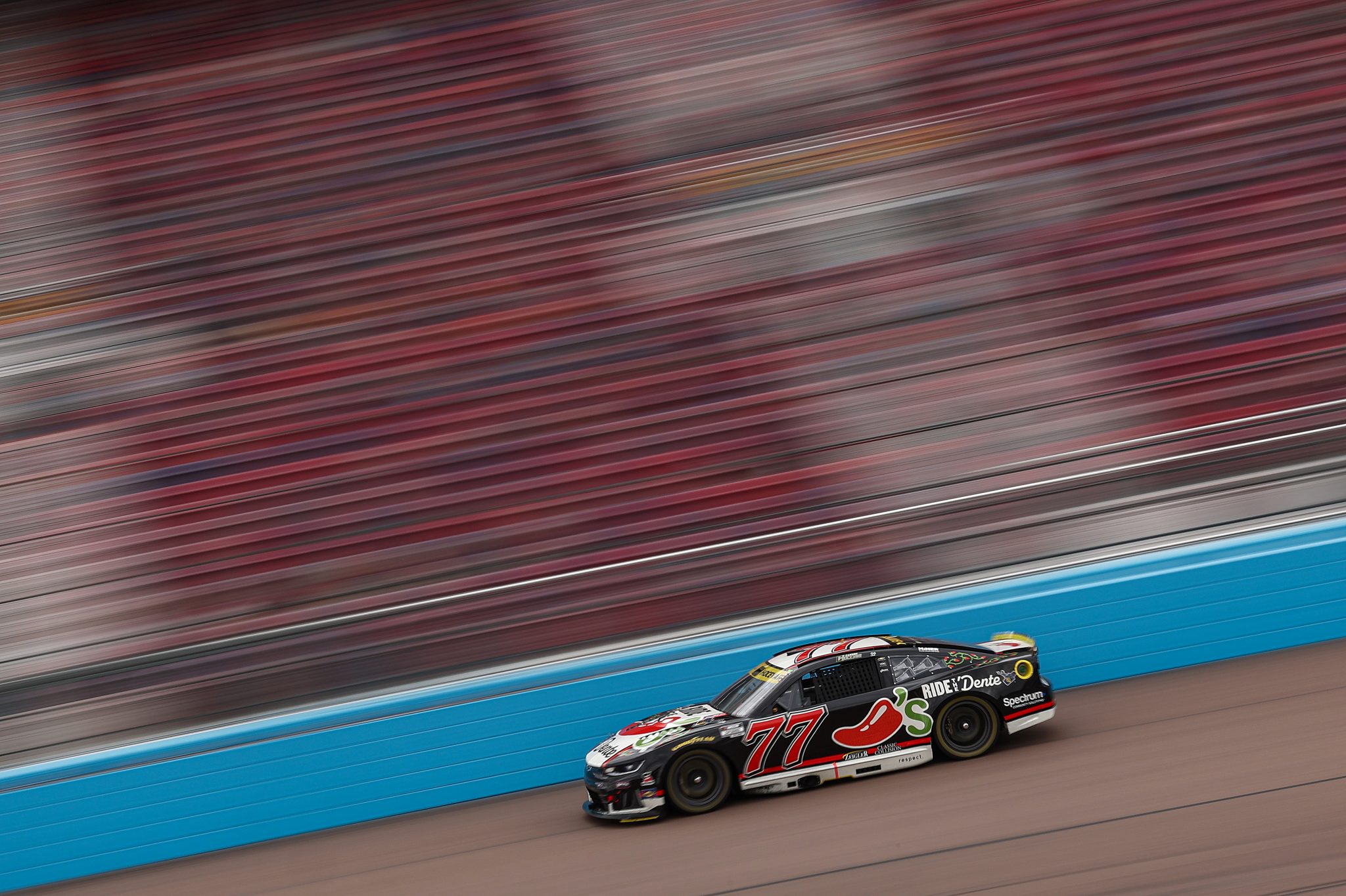 AVONDALE, ARIZONA - OCTOBER 17: Carson Hocevar, driver of the #77 Chili's Ride the 'Dente Chevrolet, drives during practice for the NASCAR Cup Series Freeway Insurance 500 at Phoenix Raceway on October 17, 2026 in Avondale, Arizona. (Photo by Meg Oliphant/Getty Images) | Getty Images
