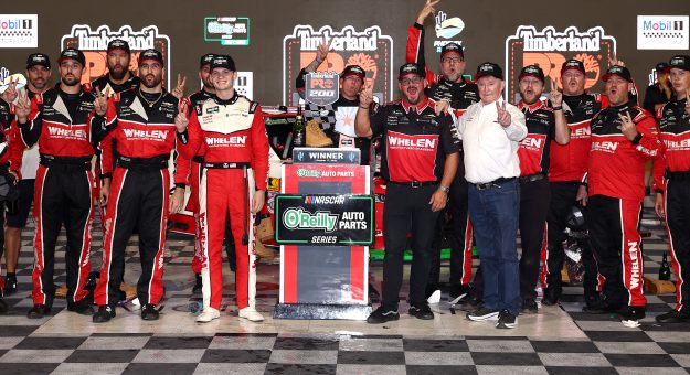 AVONDALE, ARIZONA - OCTOBER 17: Jesse Love, driver of the #2 Whelen Chevrolet, crew and NASCAR Hall of Famer and RCR team owner, Richard Childress celebrate in victory lane after winning the NASCAR O'Reilly Auto Parts Series Timberland PRO 200 at Phoenix Raceway on October 17, 2026 in Avondale, Arizona. (Photo by Meg Oliphant/Getty Images) | Getty Images