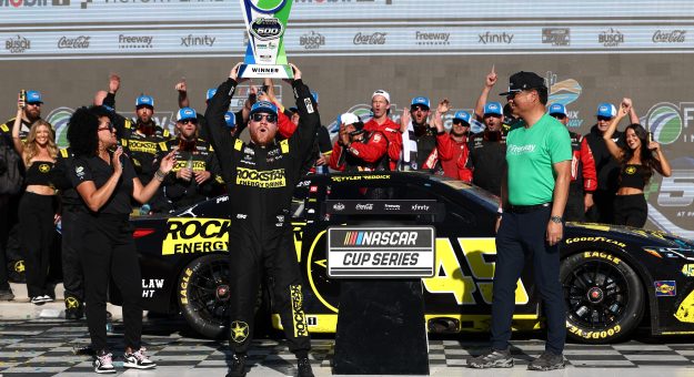AVONDALE, ARIZONA - OCTOBER 18: Tyler Reddick, driver of the #45 ROCKSTAR ENERGY DRINK Toyota, celebrates in victory lane after winning the NASCAR Cup Series Freeway Insurance 500 at Phoenix Raceway on October 18, 2026 in Avondale, Arizona. (Photo by Meg Oliphant/Getty Images) | Getty Images