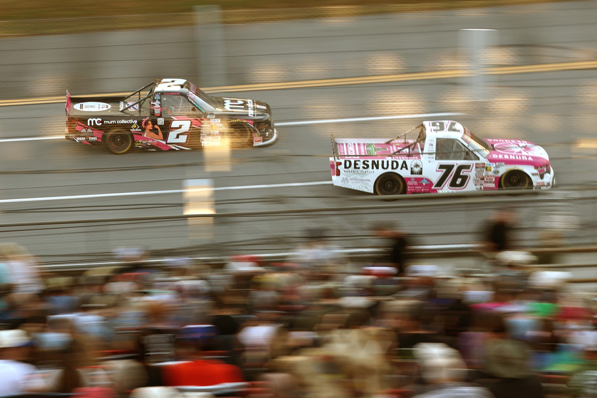 TALLADEGA, ALABAMA - OCTOBER 23: Spencer Boyd, driver of the #76 Desnuda Organic Tequila Chevrolet, and Jason White, driver of the #2 Mum Collective Ford, race during the NASCAR Craftsman Truck Series Love's RV Stop 225 at Talladega Superspeedway on October 23, 2026 in Talladega, Alabama. (Photo by Scott Taetsch/Getty Images) | Getty Images