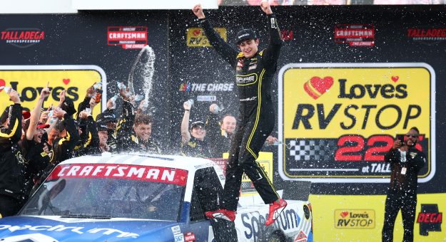 TALLADEGA, ALABAMA - OCTOBER 23: Sammy Smith, driver of the #7 Spectrum Chevrolet, celebrates with the team after winning the NASCAR Craftsman Truck Series Love's RV Stop 225 at Talladega Superspeedway on October 23, 2026 in Talladega, Alabama. (Photo by Karl Anderson/Getty Images) | Getty Images