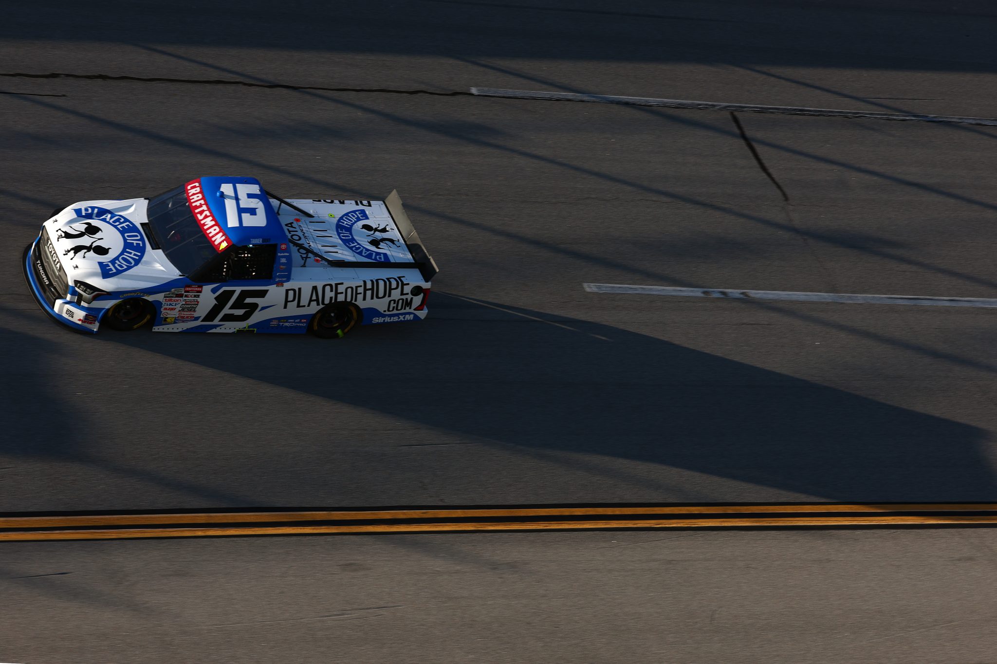 TALLADEGA, ALABAMA - OCTOBER 23: Tanner Gray, driver of the #15 Place of Hope Toyota, drives during the NASCAR Craftsman Truck Series Love's RV Stop 225 at Talladega Superspeedway on October 23, 2026 in Talladega, Alabama. (Photo by Karl Anderson/Getty Images) | Getty Images