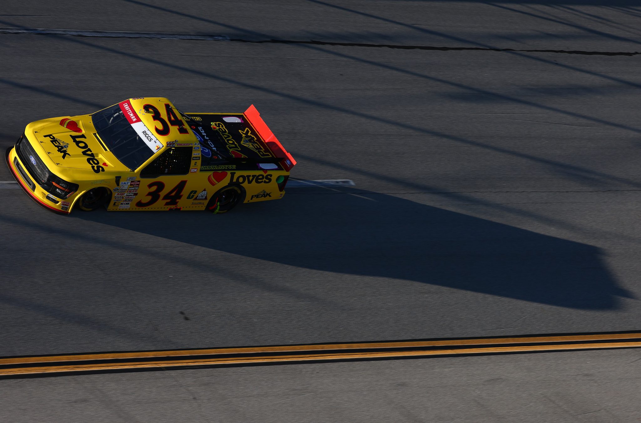 TALLADEGA, ALABAMA - OCTOBER 23: Layne Riggs, driver of the #34 Love's Travel Stops / Peak Ford, drives during the NASCAR Craftsman Truck Series Love's RV Stop 225 at Talladega Superspeedway on October 23, 2026 in Talladega, Alabama. (Photo by Karl Anderson/Getty Images) | Getty Images