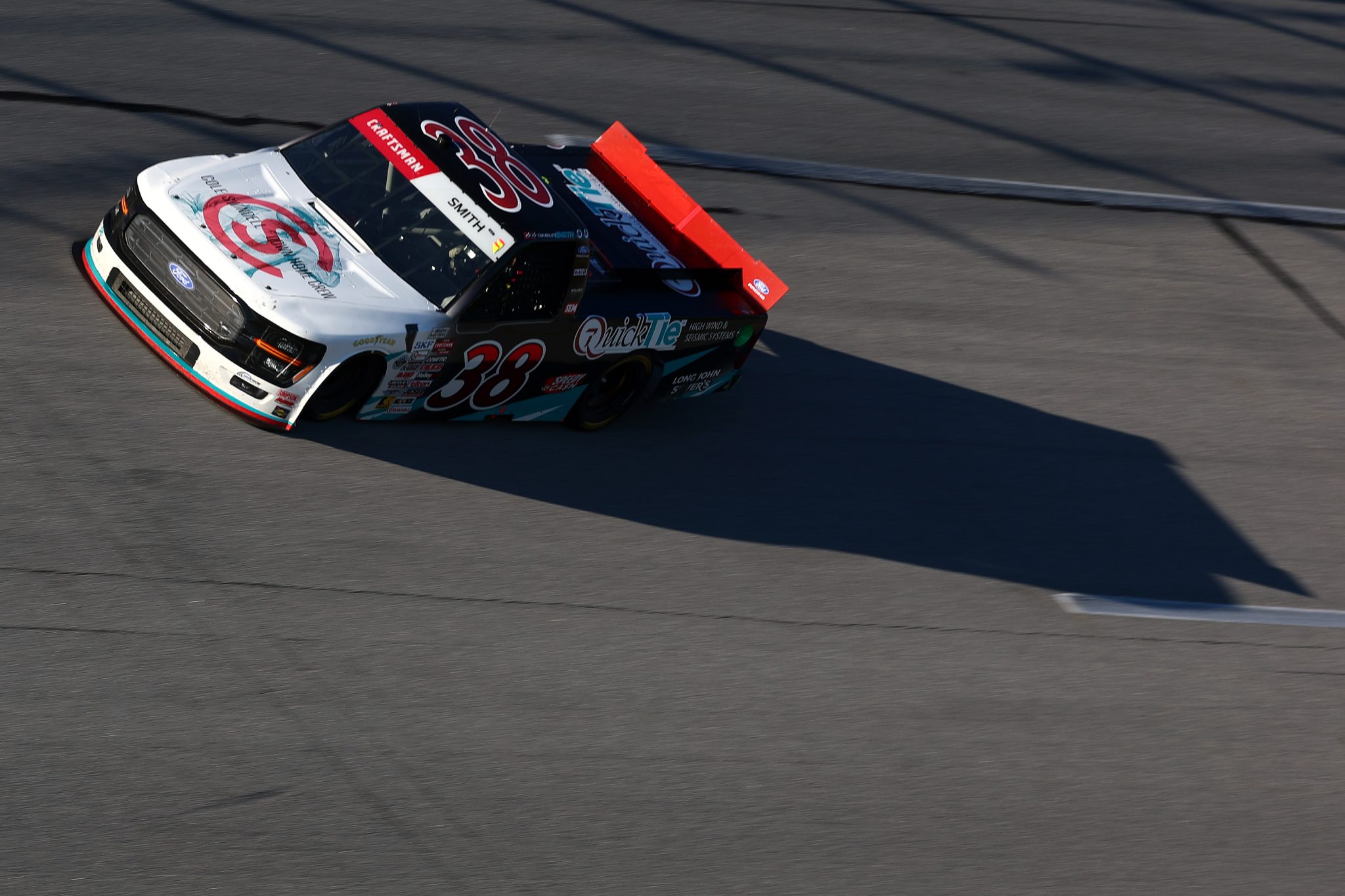 TALLADEGA, ALABAMA - OCTOBER 23: Chandler Smith, driver of the #38 QuickTie / Cole Swindell - Down Home Crew Ford, drives during the NASCAR Craftsman Truck Series Love's RV Stop 225 at Talladega Superspeedway on October 23, 2026 in Talladega, Alabama. (Photo by Karl Anderson/Getty Images) | Getty Images