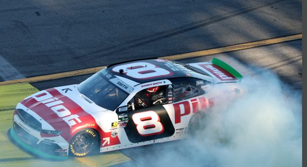TALLADEGA, ALABAMA - OCTOBER 24: Sammy Smith, driver of the #8 Pilot Chevrolet, celebrates with a burnout after winning the NASCAR O'Reilly Auto Parts Series The Progress Group 250 at Talladega Superspeedway on October 24, 2026 in Talladega, Alabama. (Photo by Scott Taetsch/Getty Images) | Getty Images