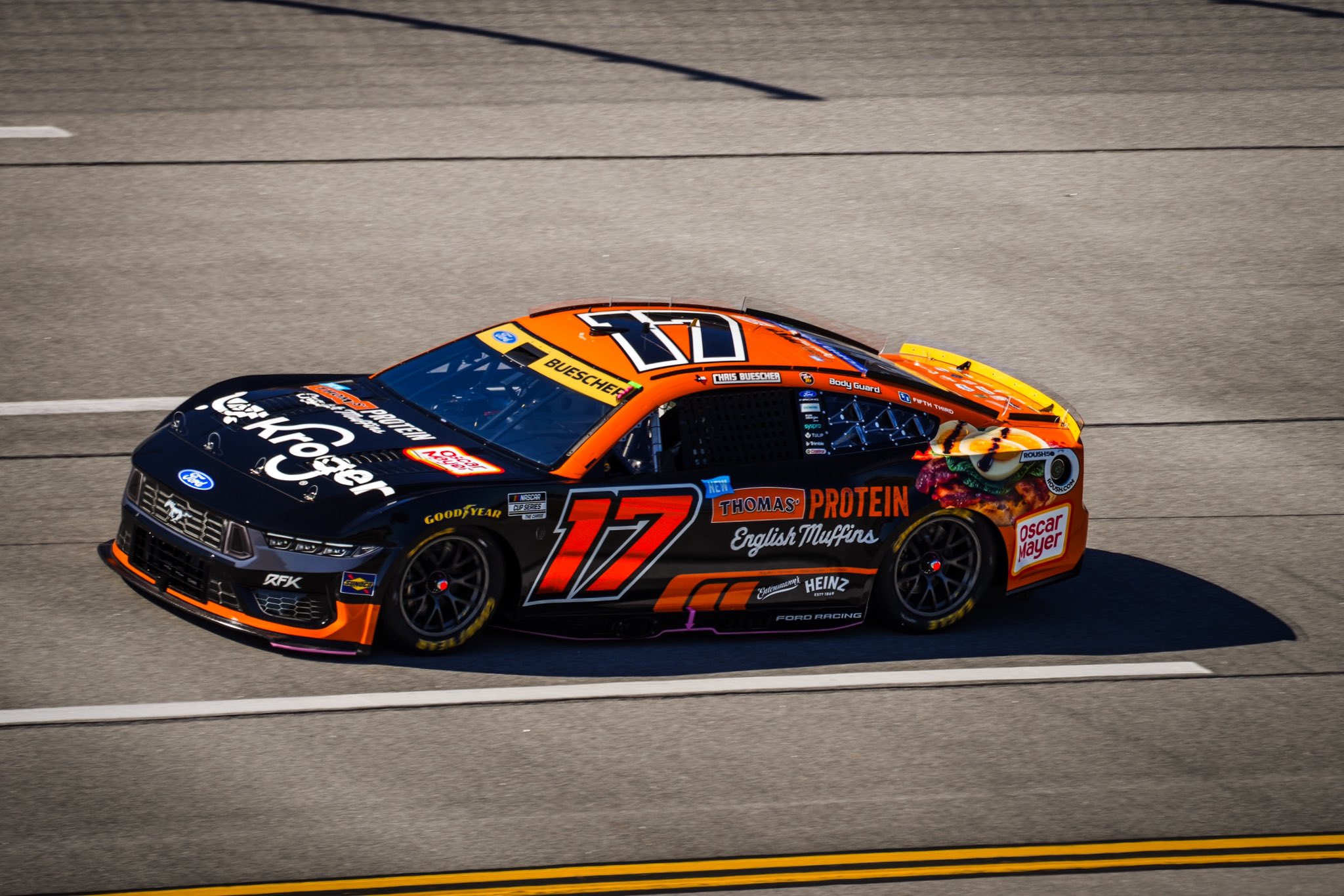 TALLADEGA, ALABAMA - OCTOBER 25: Chris Buescher, driver of the #17 Kroger / Thomas Protein Englsh Muffins/Oscar Mayar Ford, drives through the garage during the NASCAR Cup Series YellaWood 500 at Talladega Superspeedway on October 25, 2026 in Talladega, Alabama. (Photo by Scott Taetsch/Getty Images)