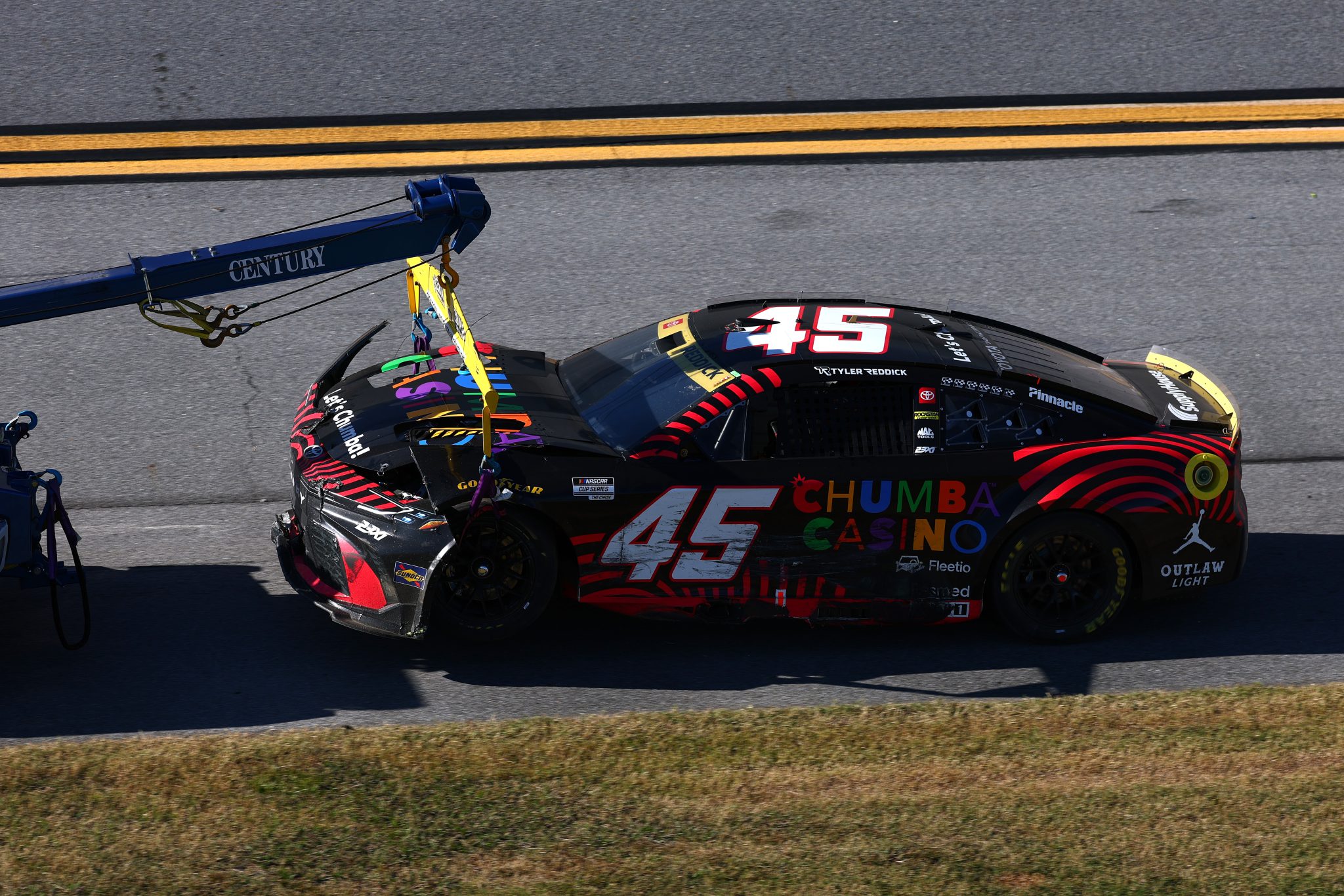 TALLADEGA, ALABAMA - OCTOBER 25: The #45 Chumba Casino Toyota driven by Tyler Reddick is towed after an on-track incident during the NASCAR Cup Series YellaWood 500 at Talladega Superspeedway on October 25, 2026 in Talladega, Alabama. (Photo by Karl Anderson/Getty Images) | Getty Images
