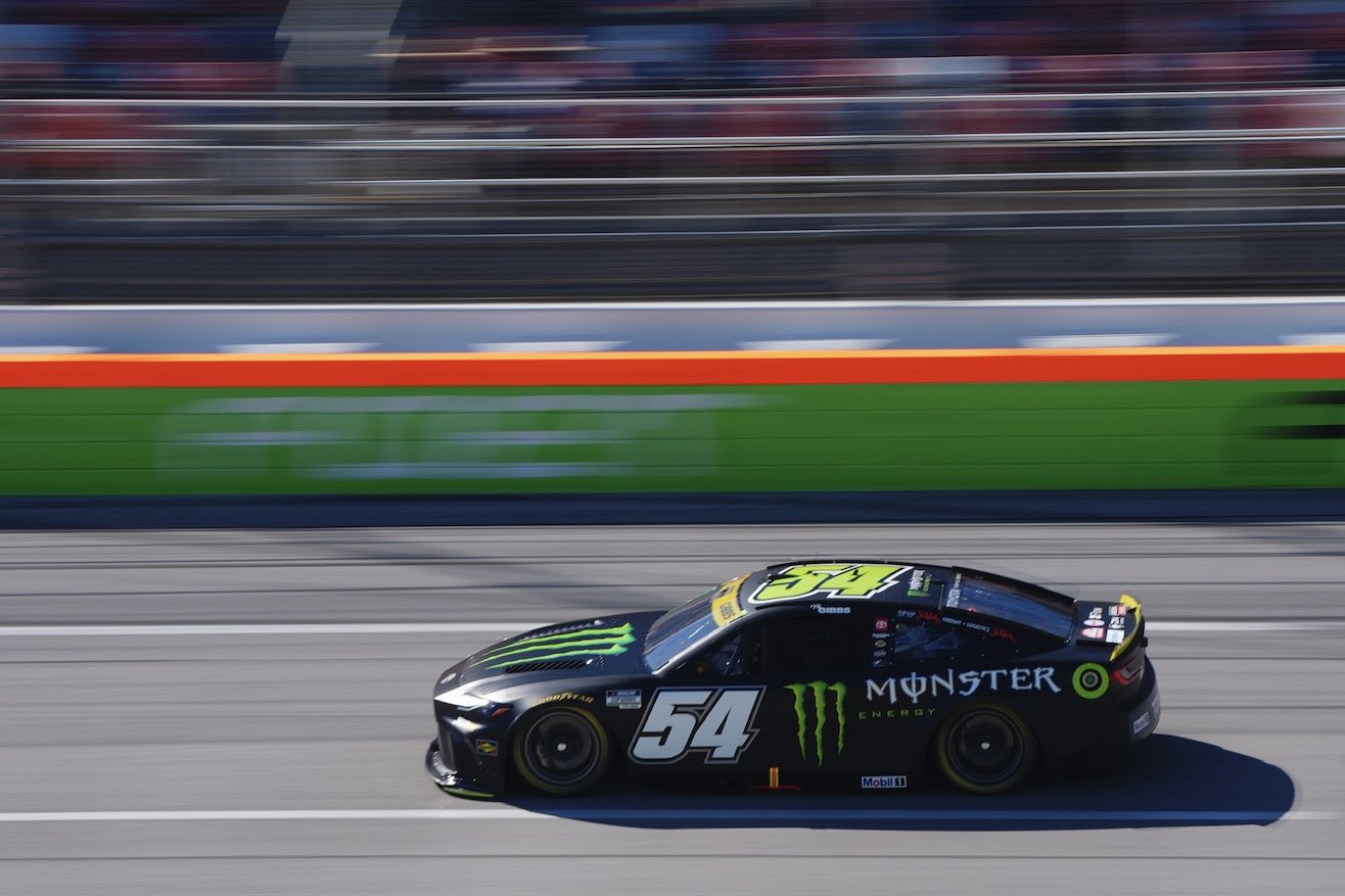 TALLADEGA, ALABAMA - OCTOBER 24: Ty Gibbs, driver of the #54 Monster Energy Toyota, drives during qualifying for the NASCAR Cup Series YellaWood 500 at Talladega Superspeedway on October 24, 2026 in Talladega, Alabama. (Photo from Joe Gibbs Racing)