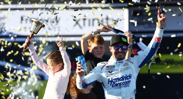 TALLADEGA, ALABAMA - OCTOBER 25: Kyle Larson, driver of the #5 HendrickCars.com Chevrolet, celebrates in victory lane after winning the NASCAR Cup Series YellaWood 500 at Talladega Superspeedway on October 25, 2026 in Talladega, Alabama. (Photo by Karl Anderson/Getty Images) | Getty Images