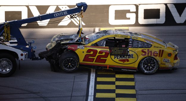TALLADEGA, ALABAMA - OCTOBER 25: Joey Logano, driver of the #22 Shell Pennzoil Ford, is towed after an on-track incident during the NASCAR Cup Series YellaWood 500 at Talladega Superspeedway on October 25, 2026 in Talladega, Alabama. (Photo by Sean Gardner/Getty Images) | Getty Images