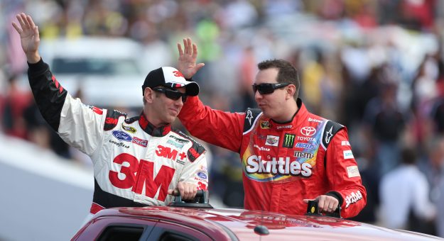 AVONDALE, AZ - MARCH 02:  Greg Biffle, driver of the #16 3M Ford, and Kyle Busch, driver of the #18 Skittles Toyota, during the NASCAR Sprint Cup Series The Profit On CNBC 500 at Phoenix International Raceway on March 2, 2014 in Avondale, Arizona.  (Photo by Todd Warshaw/NASCAR via Getty Images)