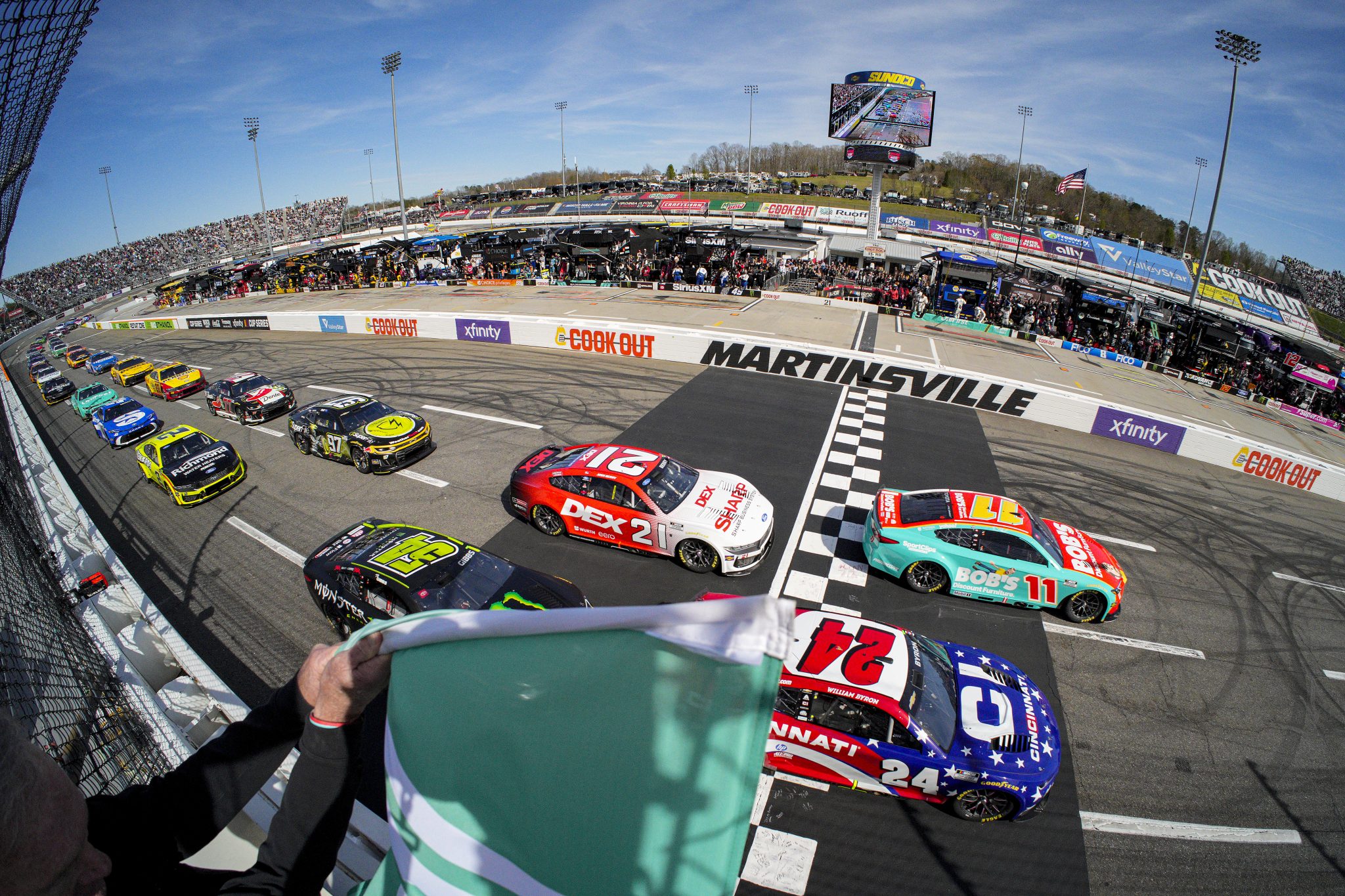 MARTINSVILLE, VIRGINIA - MARCH 29: Denny Hamlin, driver of the #11 Bob's Discount Furniture Toyota, leads the field to the green flag to start the NASCAR Cup Series Cook Out 400 at Martinsville Speedway on March 29, 2026 in Martinsville, Virginia. (Photo by Jacob Kupferman/Getty Images) | Getty Images