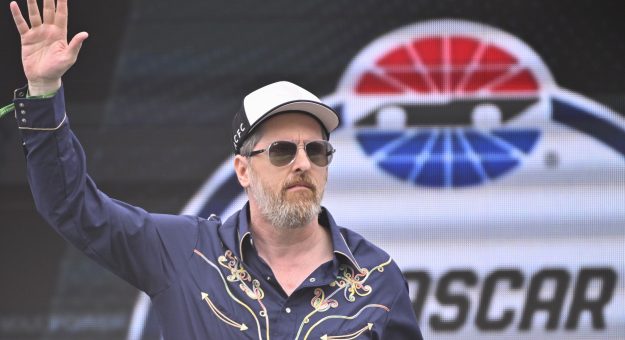 AUSTIN, TEXAS - MARCH 26:  Grand Marshal Brendan Hunt waves to fans as he walks onstage during pre-race ceremonies prior to the NASCAR Cup Series EchoPark Automotive Grand Prix at Circuit of The Americas on March 26, 2023 in Austin, Texas. (Photo by Logan Riely/Getty Images) | Getty Images