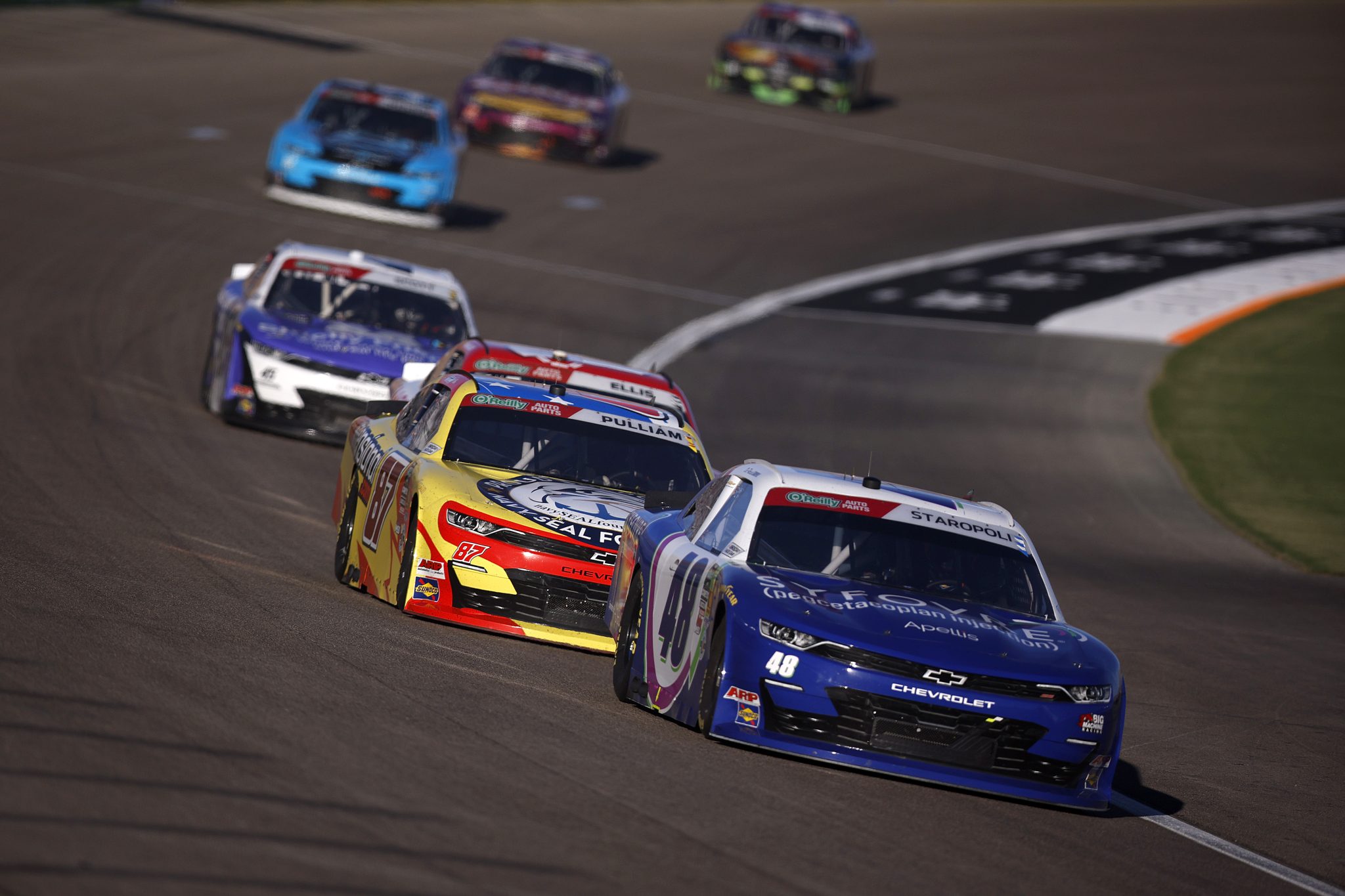 LAS VEGAS, NEVADA - OCTOBER 03: Patrick Staropoli, driver of the #48 Syfovre Chevrolet, and Lee Pulliam, driver of the #87 3 Dimensional Services Chevrolet, race during the NASCAR O'Reilly Auto Parts Series Focused Health 302 at Las Vegas Motor Speedway on October 03, 2026 in Las Vegas, Nevada. (Photo by Sean Gardner/Getty Images) | Getty Images