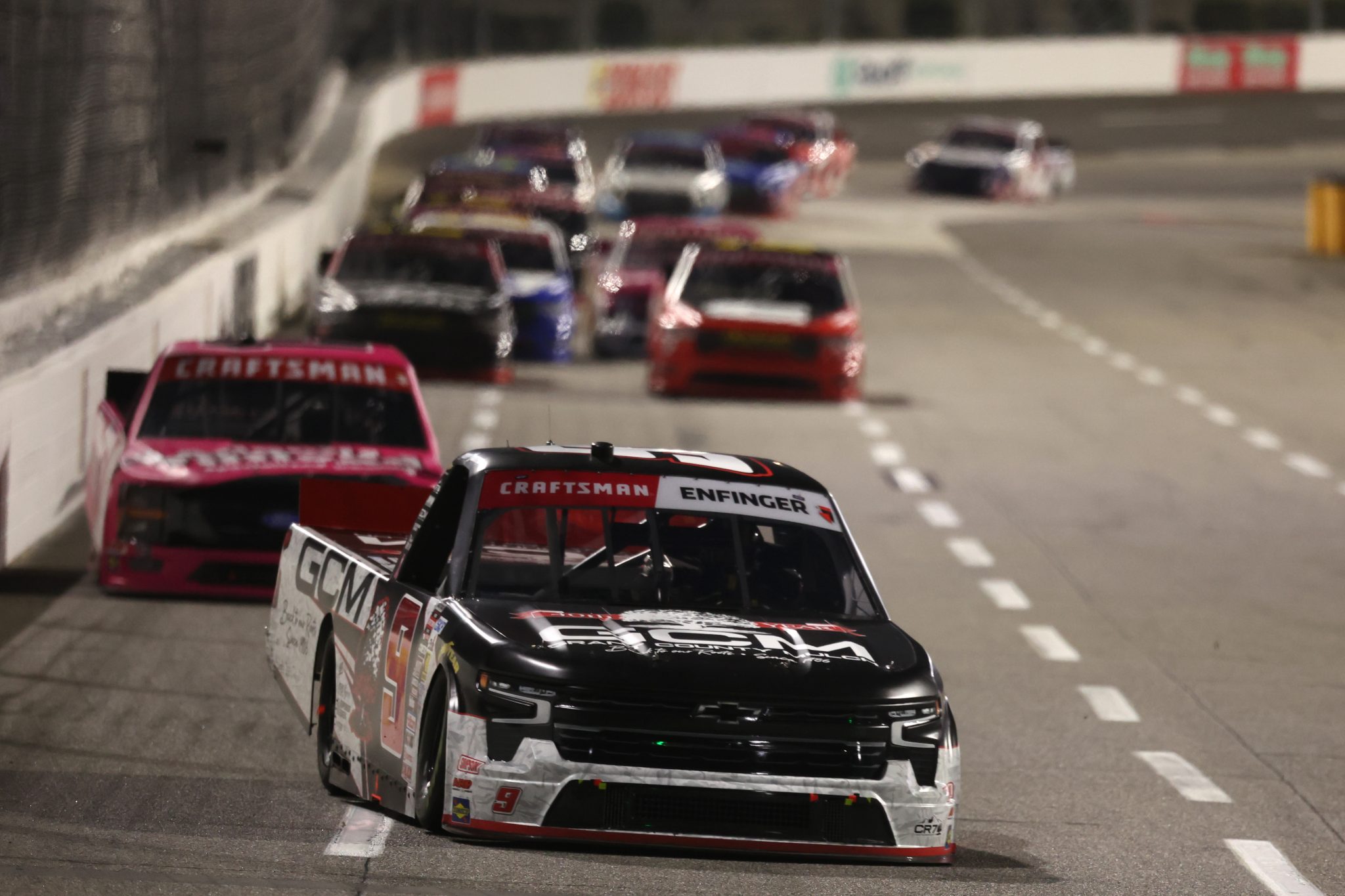 MARTINSVILLE, VIRGINIA - OCTOBER 30: Grant Enfinger, driver of the #9 Grant County Mulch/Champion Chevrolet, races during the NASCAR Craftsman Truck Series Black's Tire 200 presented by Down East Heating & Air Conditioning at Martinsville Speedway on October 30, 2026 in Martinsville, Virginia. (Photo by David Jensen/Getty Images) | Getty Images