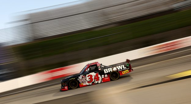 MARTINSVILLE, VIRGINIA - OCTOBER 30: Layne Riggs, driver of the #34 BKB Bare Knuckle Boxing Ford, races during the NASCAR Craftsman Truck Series Black's Tire 200 presented by Down East Heating & Air Conditioning at Martinsville Speedway on October 30, 2026 in Martinsville, Virginia. (Photo by Meg Oliphant/Getty Images) | Getty Images