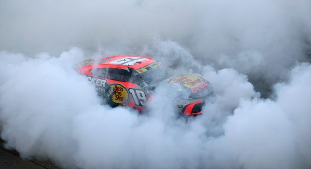 LAS VEGAS, NEVADA - OCTOBER 04: Chase Briscoe, driver of the #19 Bass Pro Shops Toyota, celebrates with a burnout after winning the NASCAR Cup Series South Point 400 at Las Vegas Motor Speedway on October 04, 2026 in Las Vegas, Nevada. (Photo by Chris Graythen/Getty Images) | Getty Images