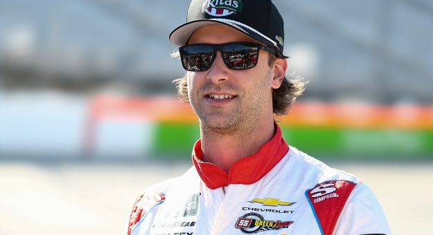 DOVER, DELAWARE - MAY 16: Josh Bilicki, driver of the #07 Rita's Water Ice Chevrolet, looks on during practice for the NASCAR O'Reilly Auto Parts Series BetRivers 200 at Dover Motor Speedway on May 16, 2026 in Dover, Delaware. (Photo by Meg Oliphant/Getty Images) | Getty Images