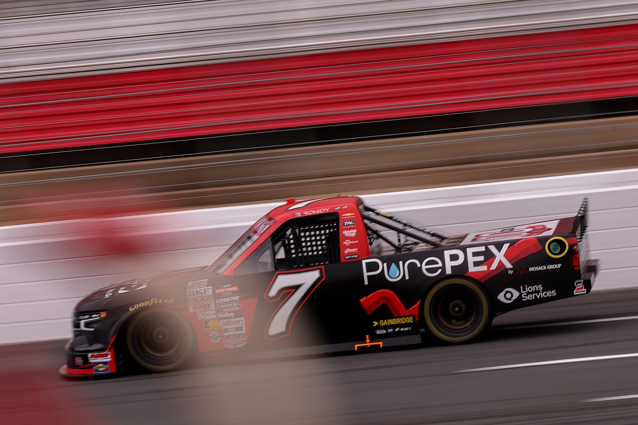 CONCORD, NORTH CAROLINA - OCTOBER 09: Connor Mosack, driver of the #7 PurePEX Chevrolet, drives during practice for the NASCAR Craftsman Truck Series Ecosave 200 at Charlotte Motor Speedway on October 09, 2026 in Concord, North Carolina. (Photo by David Jensen/Getty Images) | Getty Images