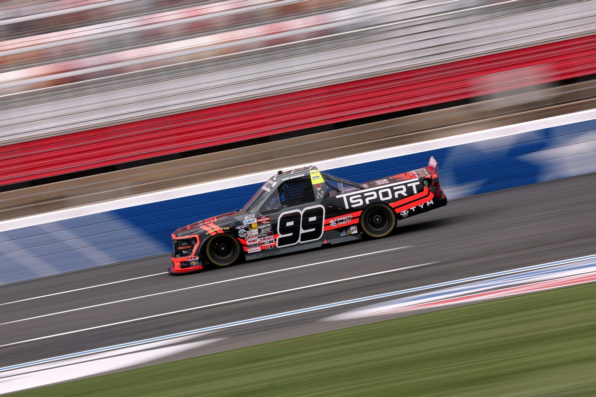 CONCORD, NORTH CAROLINA - OCTOBER 09: Ben Rhodes, driver of the #99 TSPORT Ford, drives during practice for the NASCAR Craftsman Truck Series Ecosave 200 at Charlotte Motor Speedway on October 09, 2026 in Concord, North Carolina. (Photo by David Jensen/Getty Images) | Getty Images