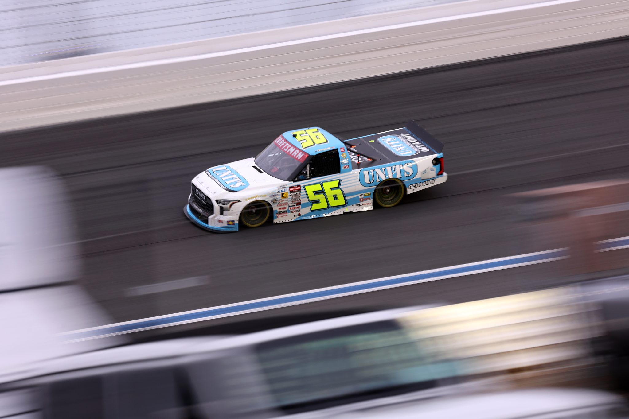 CONCORD, NORTH CAROLINA - OCTOBER 09: Timmy Hill, driver of the #56 UNITS Toyota, drives during the NASCAR Craftsman Truck Series Ecosave 200 at Charlotte Motor Speedway on October 09, 2026 in Concord, North Carolina. (Photo by David Jensen/Getty Images) | Getty Images