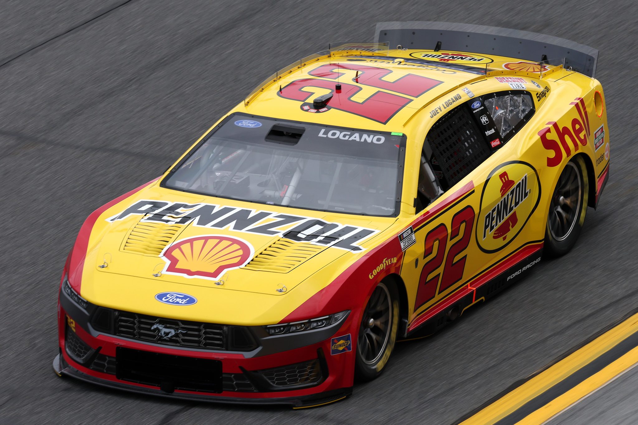 DAYTONA BEACH, FLORIDA - FEBRUARY 11: Joey Logano, driver of the #22 Shell Pennzoil Ford, drives during practice for the NASCAR Cup Series Daytona 500 at Daytona International Speedway on February 11, 2026 in Daytona Beach, Florida. (Photo by Chris Graythen/Getty Images) | Getty Images