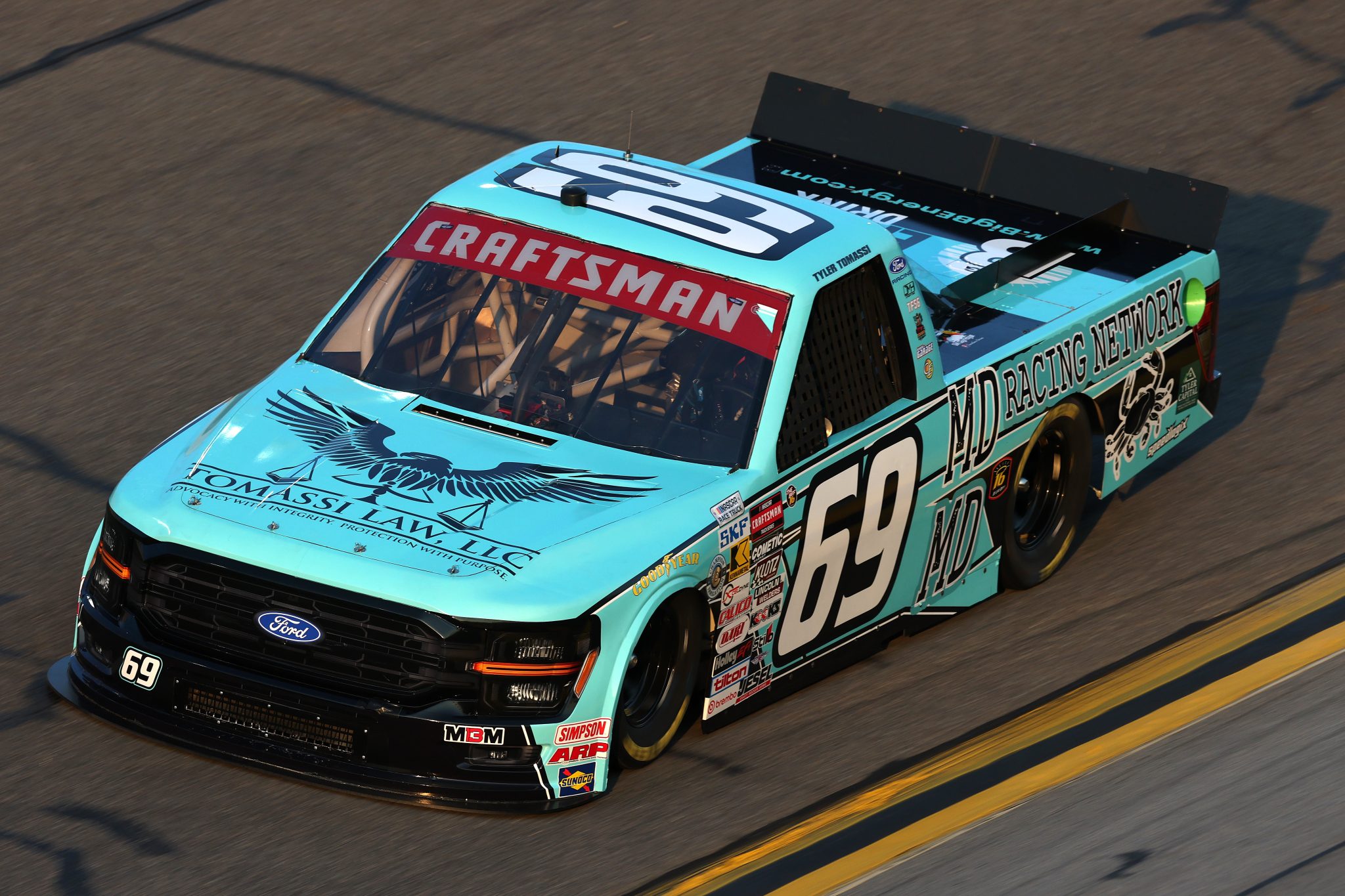 DAYTONA BEACH, FLORIDA - FEBRUARY 12: Tyler Tomassi, driver of the #69 TomassiLaw/MDRacingNetwork Ford, drives during Duel 1 for the NASCAR Cup Series Daytona 500 at Daytona at Daytona International Speedway on February 12, 2026 in Daytona Beach, Florida. (Photo by Chris Graythen/Getty Images) | Getty Images